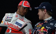 Гран При Бахрейна  2012 г суббота 20 апреля квалификация  Льюис Хэмилтон Vodafone McLaren Mercedes и Себастьян Феттель Red Bull Racing