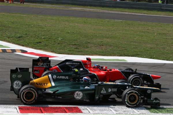 Гран При Италии 2012 г. Воскресенье 9 сентября гонка Виталий Петров Caterham F1 Team и Тимо Глок Marussia F1 Team
