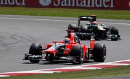 Гран При Великобритании  2012 г Воскресенье 8 июля гонка Тимо Глок Marussia F1 Team и Хейкки Ковалайнен Caterham F1 Team